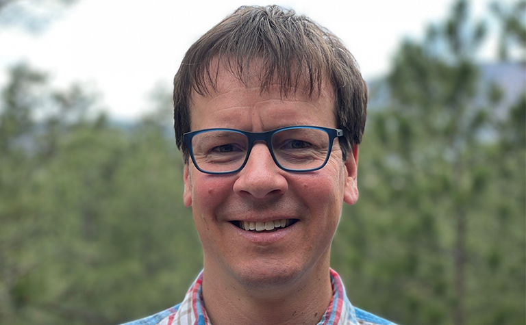 Gavin Anderson, a lead solution architect, is living our purpose by helping ensure our connectivity is resilient against extreme weather.