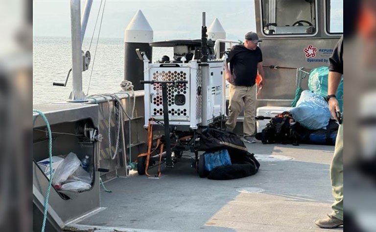 FirstNet Compact Rapid Deployable (CRD) being deployed via barge during the Pioneer Fire.